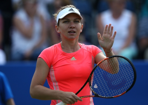 BIRMINGHAM, ENGLAND - JUNE 16:  Simona Halep of Romania celebrates victory in her match against Naomi Broady of Great Britain on day two of the Aegon Classic at Edgbaston Priory Club on June 16, 2015 in Birmingham, England.  (Photo by Jan Kruger/Getty Images for LTA)